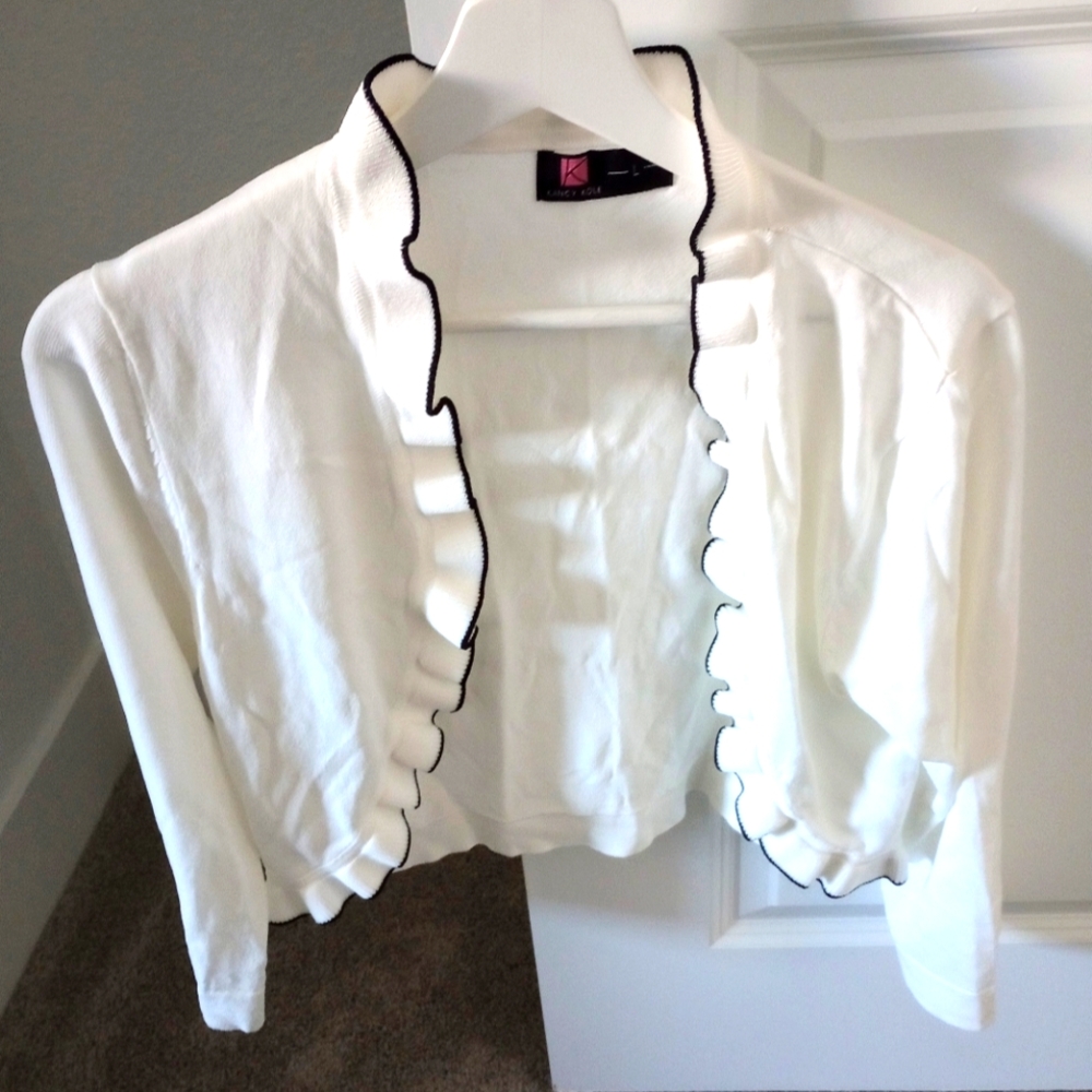 KANCY KOLE WHITE WITH BLACK EDGING WRAP ( SHRUG)SIZE LARGE, 3/4 LENGTH SLEEVE